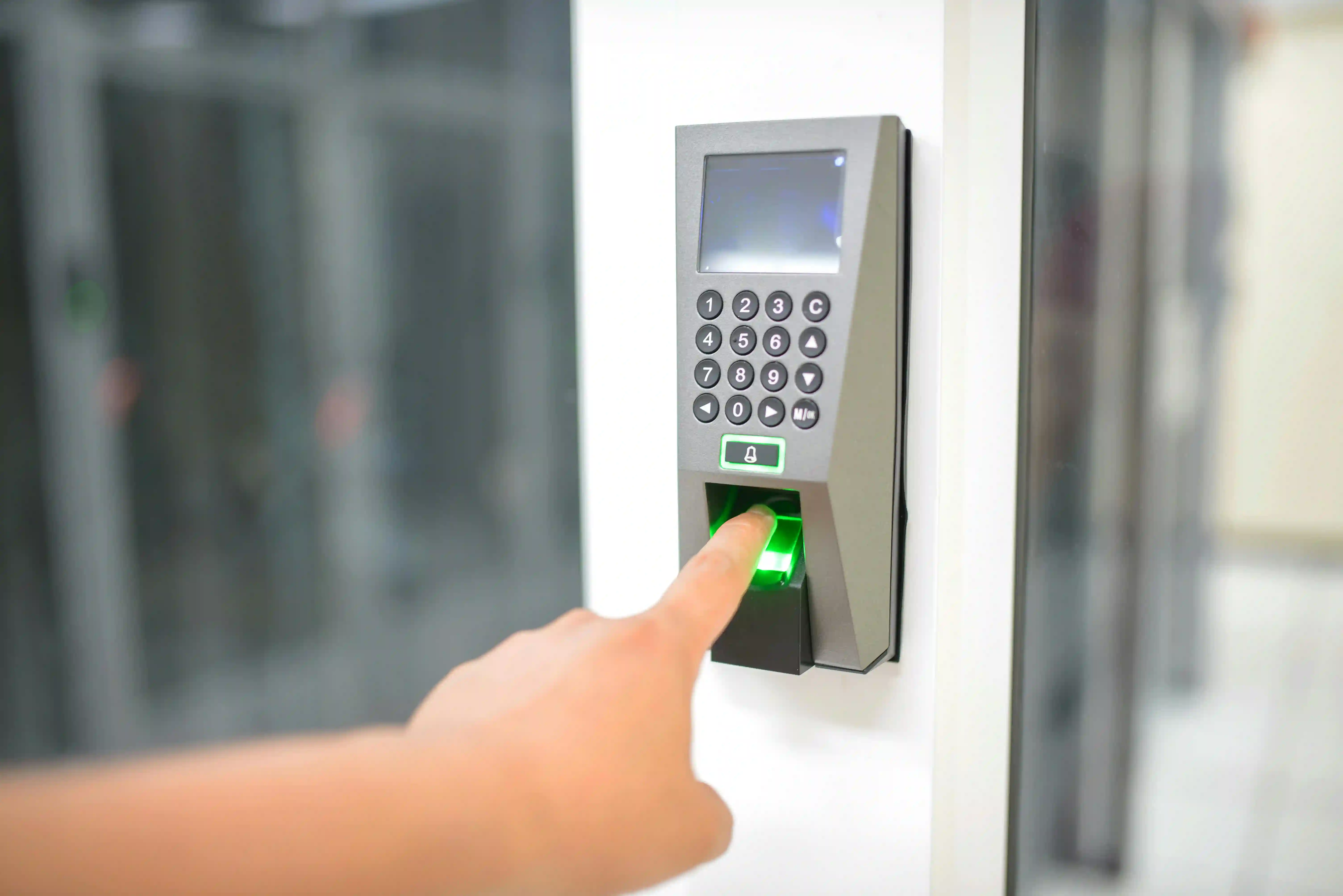 Rafnacon's Security Surveillance & Access Control System services in Pakistan, featuring a state-of-the-art fingerprint access control system installed in a commercial building.